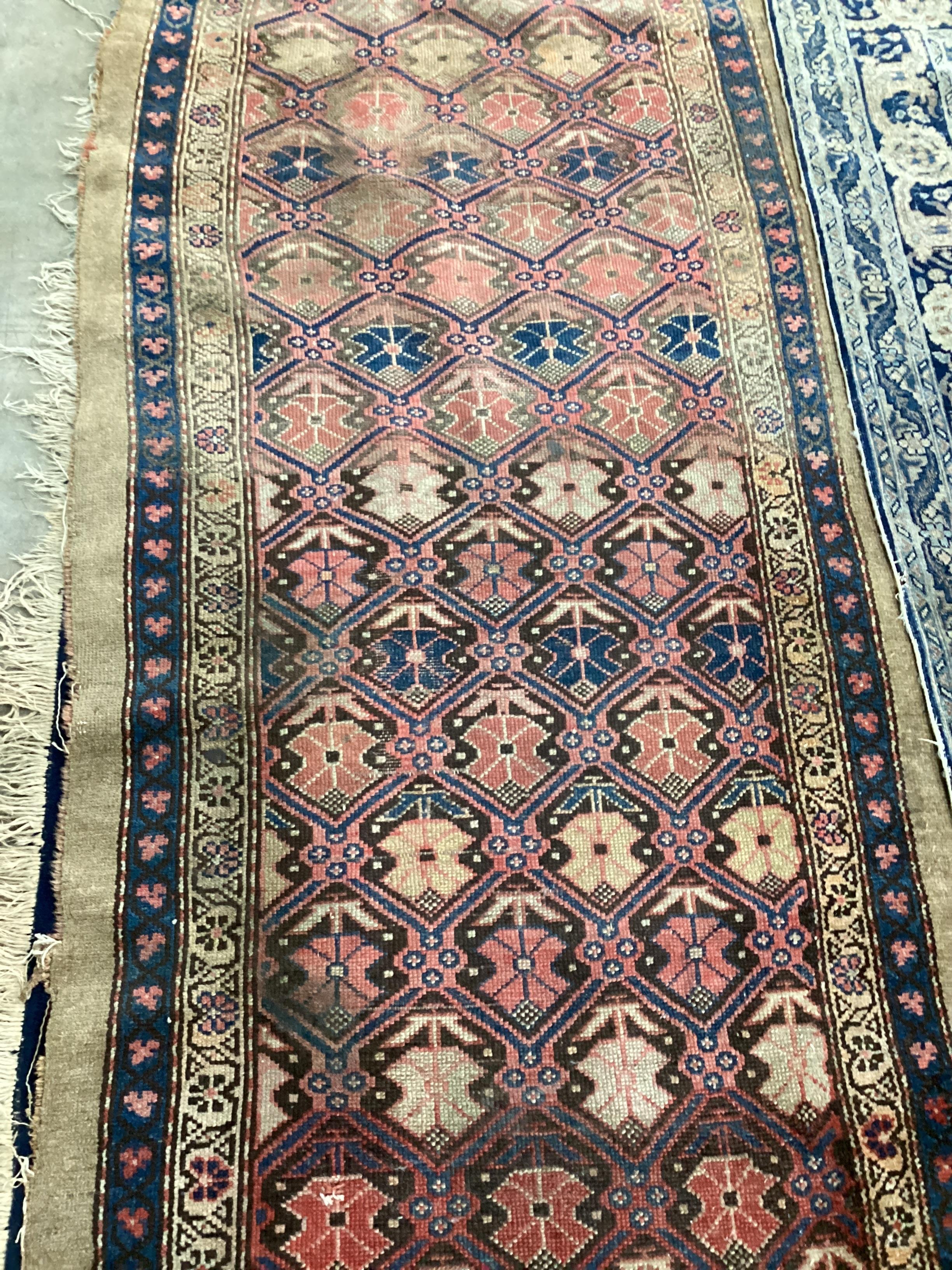 Four antique North West Persian and Caucasian rugs, largest 180 x 142cm